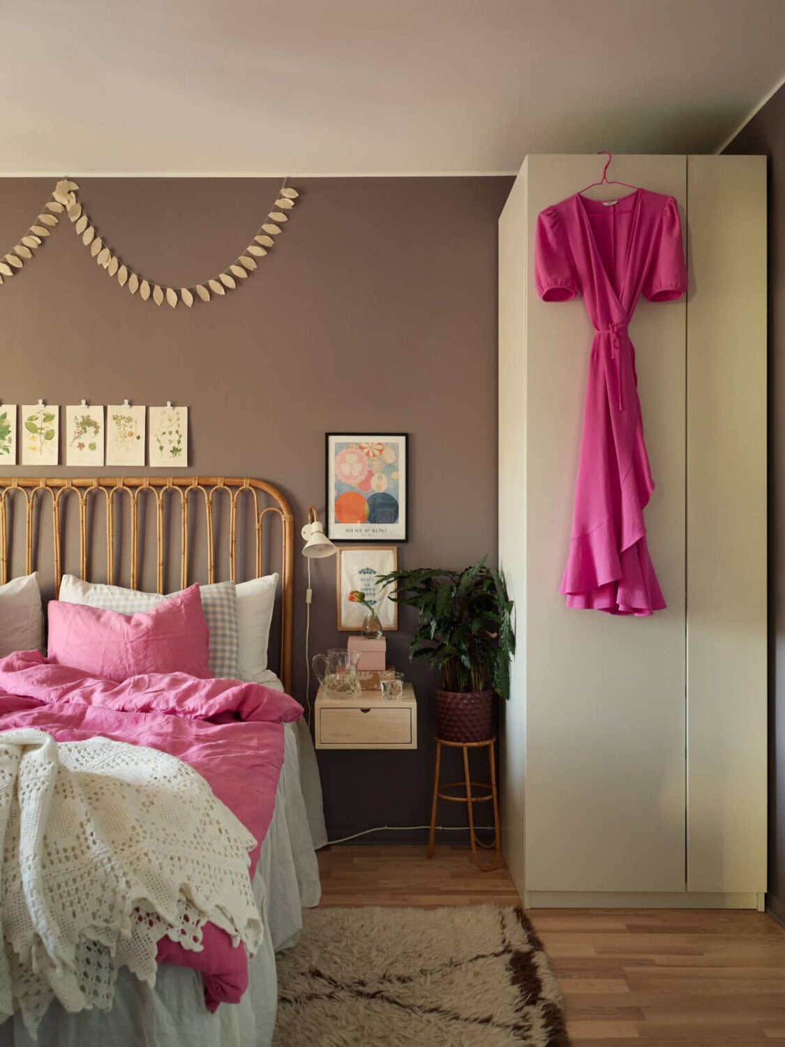 A Colorful Midcentury Apartment Filled with Art and Plants 18 rattan bed large wardrobes
