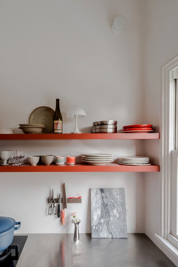 A Modern Apartment in a London Victorian House 13 red kitchen shelves