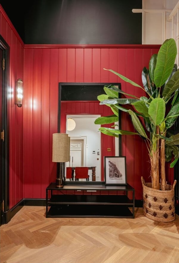A Unique Ground Floor Duplex Apartment in Amsterdam 28 red wall paneling hallway