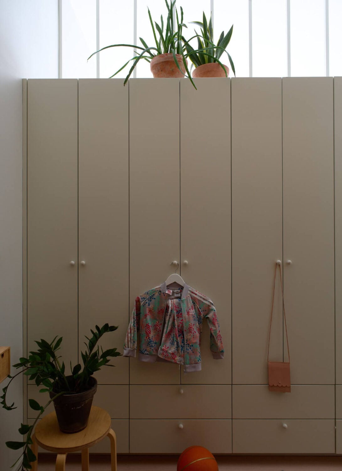 High Ceilings in a Small Swedish Loft Designed for a Family 17 room dividing wardrobes