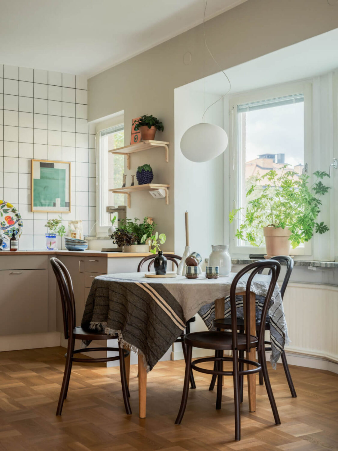 A Swedish 1940s Apartment with Lovely Balcony Views 10 round dining table