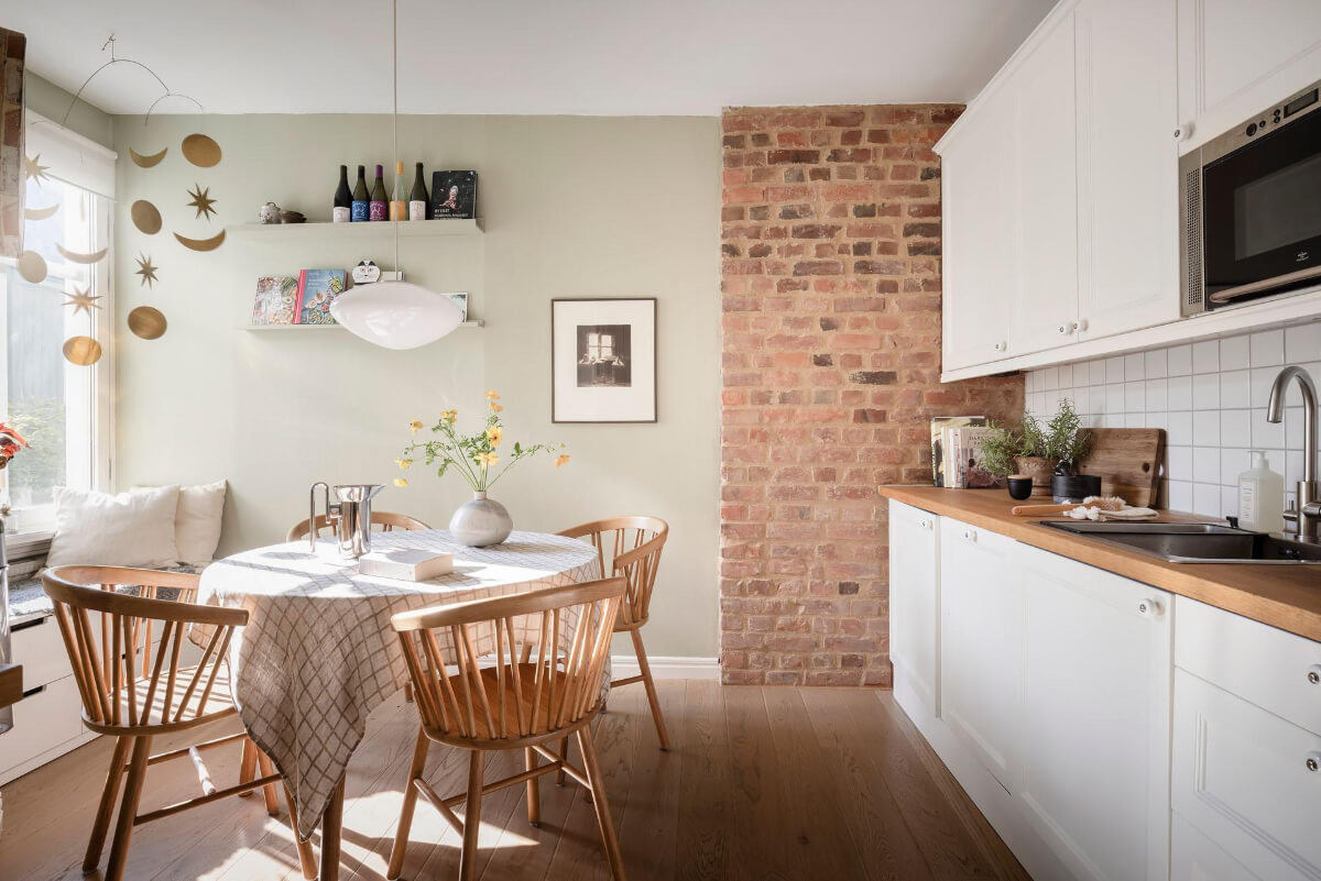 Bright Rooms with Light Color Tones in a Swedish Apartment 13 round kitchen table and window seat
