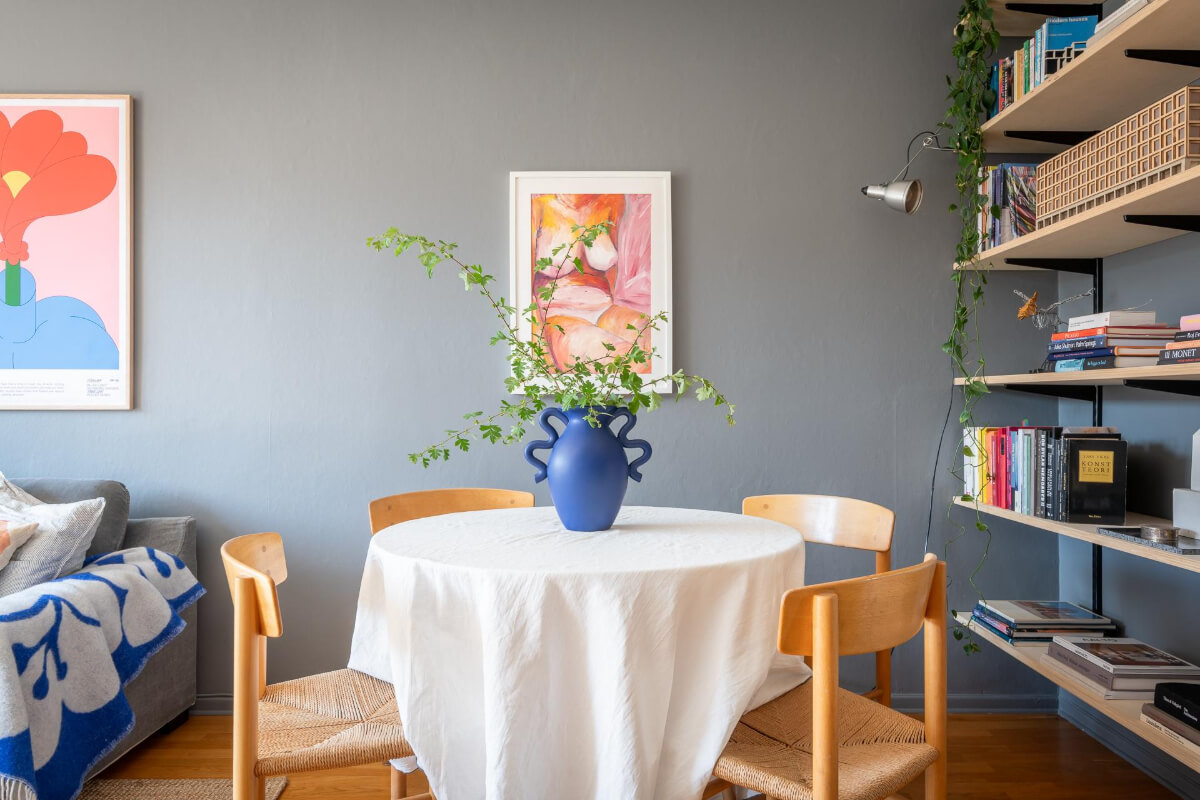Light Rooms and a Moody Color Palette in a 1930s Apartment 14 round table shelves