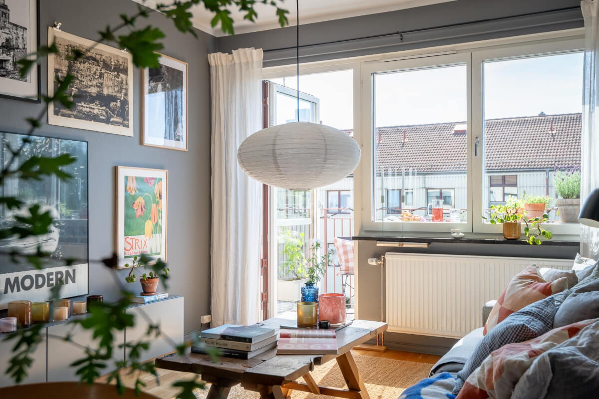 Light Rooms and a Moody Color Palette in a 1930s Apartment 4 rustic wooden coffee table