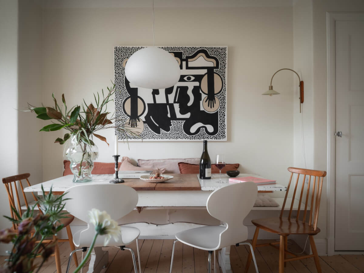A Renovated Duplex Apartment with Exposed Brick Walls 5 rustic wooden dining table with bench