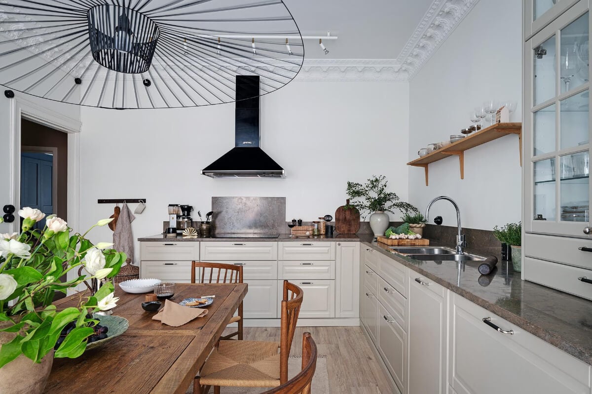 Warm and Inviting Rooms in a Renovated Swedish Apartment 15 rustic wooden dining table
