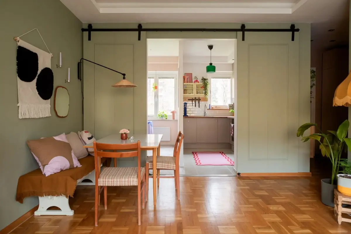 A Swedish Apartment with a Dutch Parquet Floor and Terracotta Bedroom 5 sage green living room with dining table