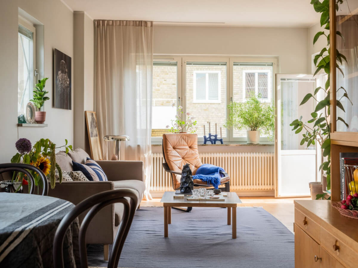 A Swedish 1940s Apartment with Lovely Balcony Views 5 scandi living room natural light