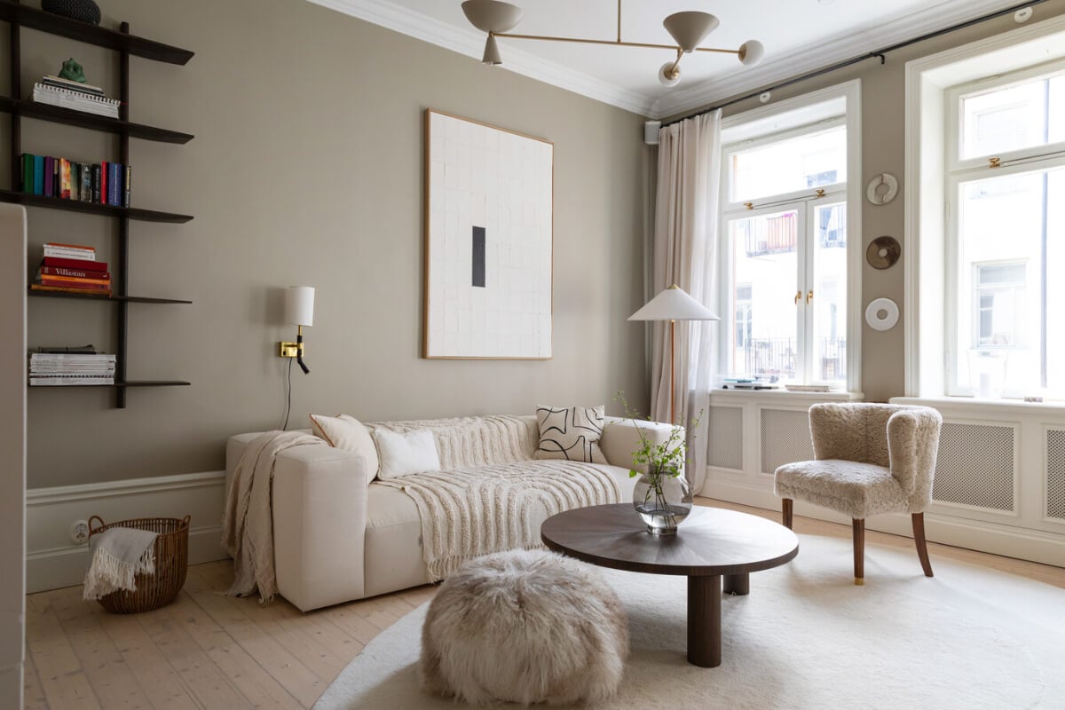 A Calm, Neutral Color Palette in a Classic Swedish Apartment 2 scandi living room wooden floor large windows