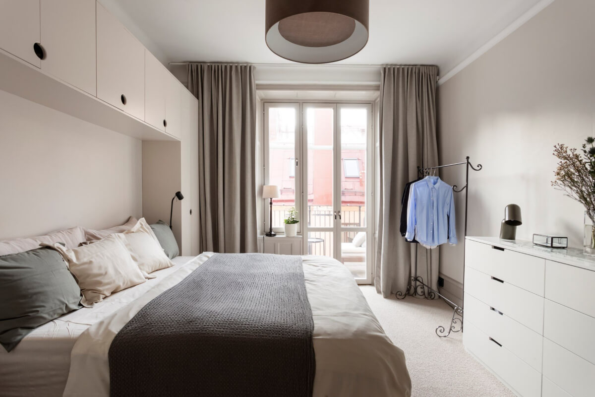 A Stylish Two-Bedroom Apartment in Stockholm 14 serene bedroom carpet floor