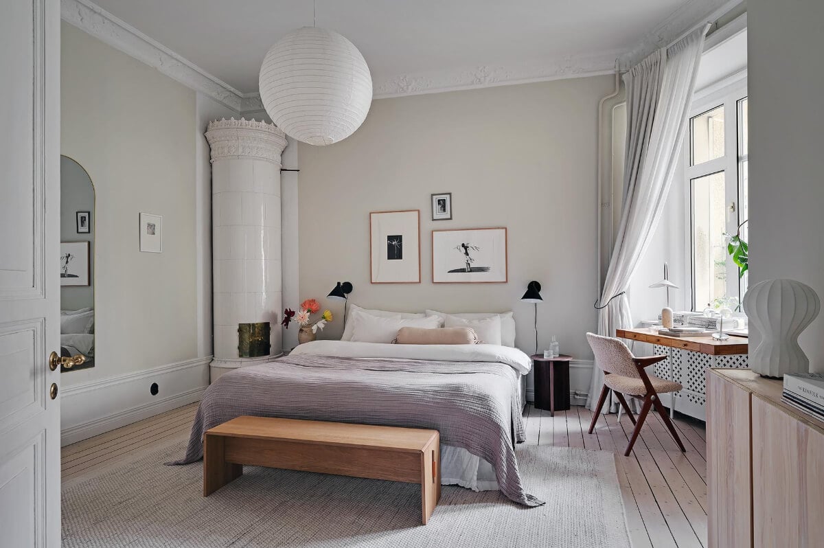 Period Features and Modern Materials in a Swedish Apartment 17 serene bedroom desk under window