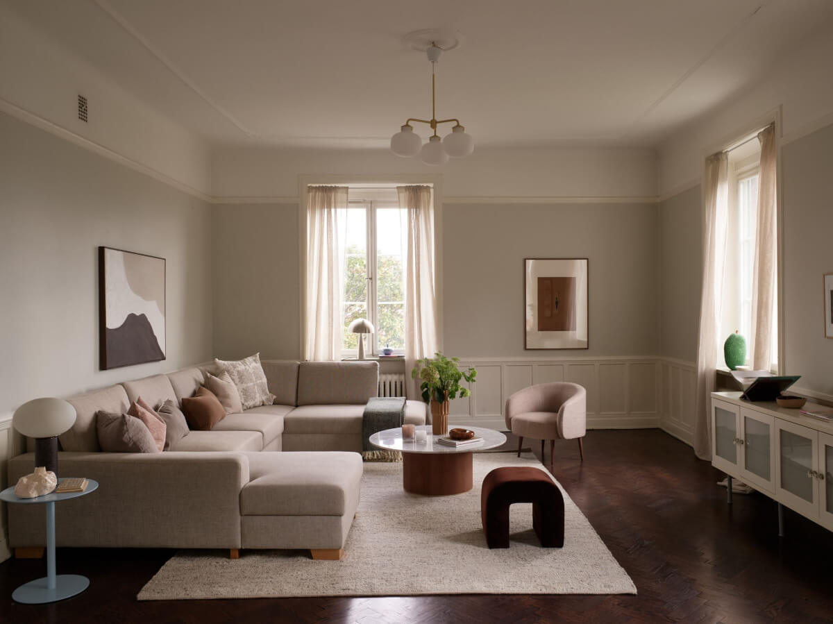 A Grand Early 20th-Century Apartment in Stockholm 10 serene living room dark wooden floor