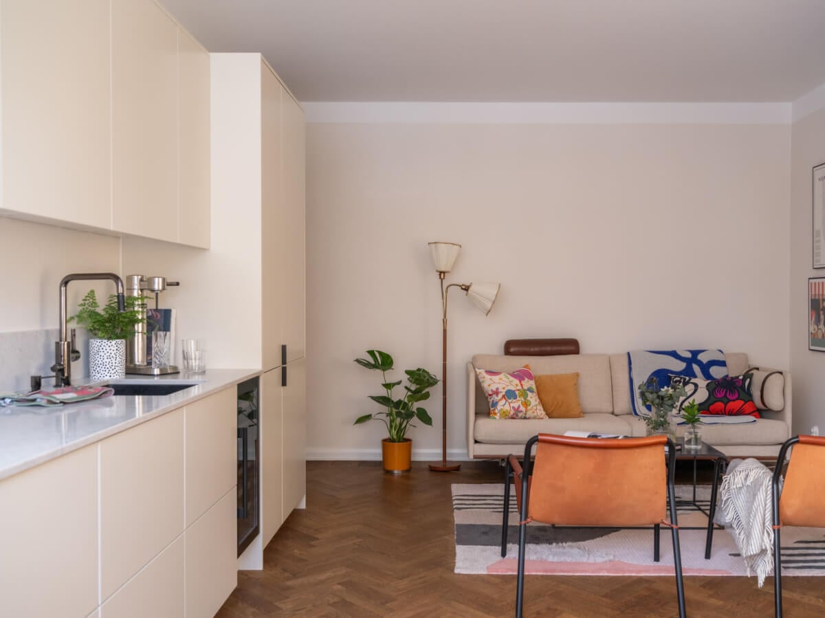 A Light, Renovated Two-Bedroom Apartment in Stockholm 10 serene living room modern kitchen