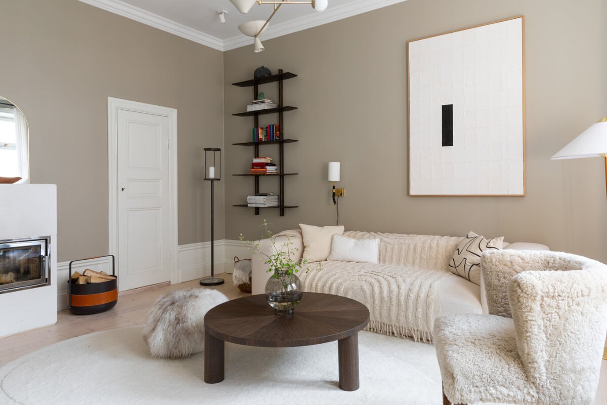 A Calm, Neutral Color Palette in a Classic Swedish Apartment 5 serene living room sand colored walls