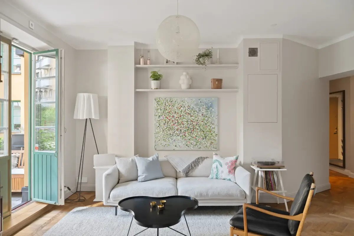 A Charming Ground Floor Family Apartment in Stockholm 6 serene living room shelves in niche