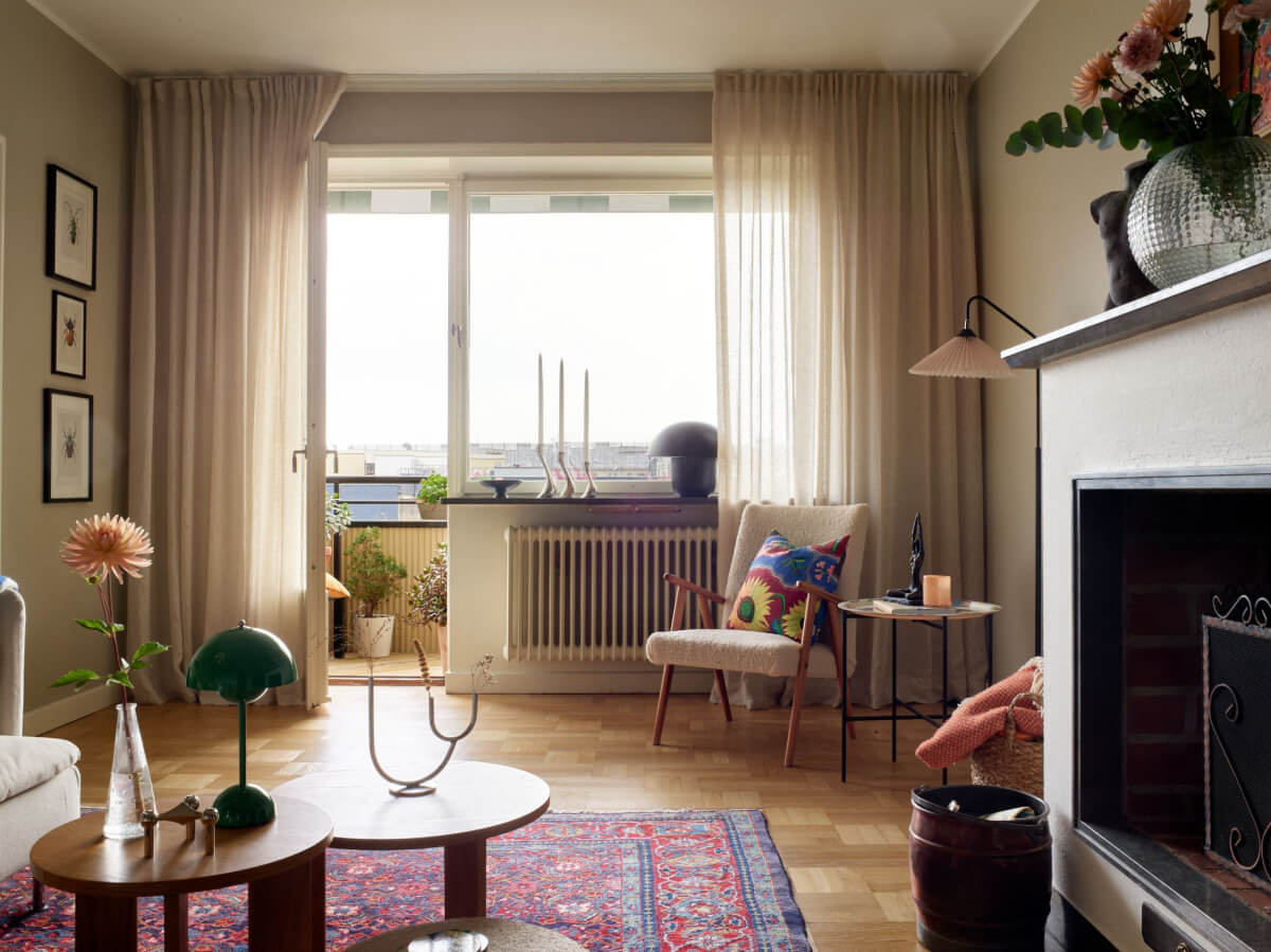 A Charming Two-Bedroom Corner Apartment in a 1940s Building 6 serene living room with balcony