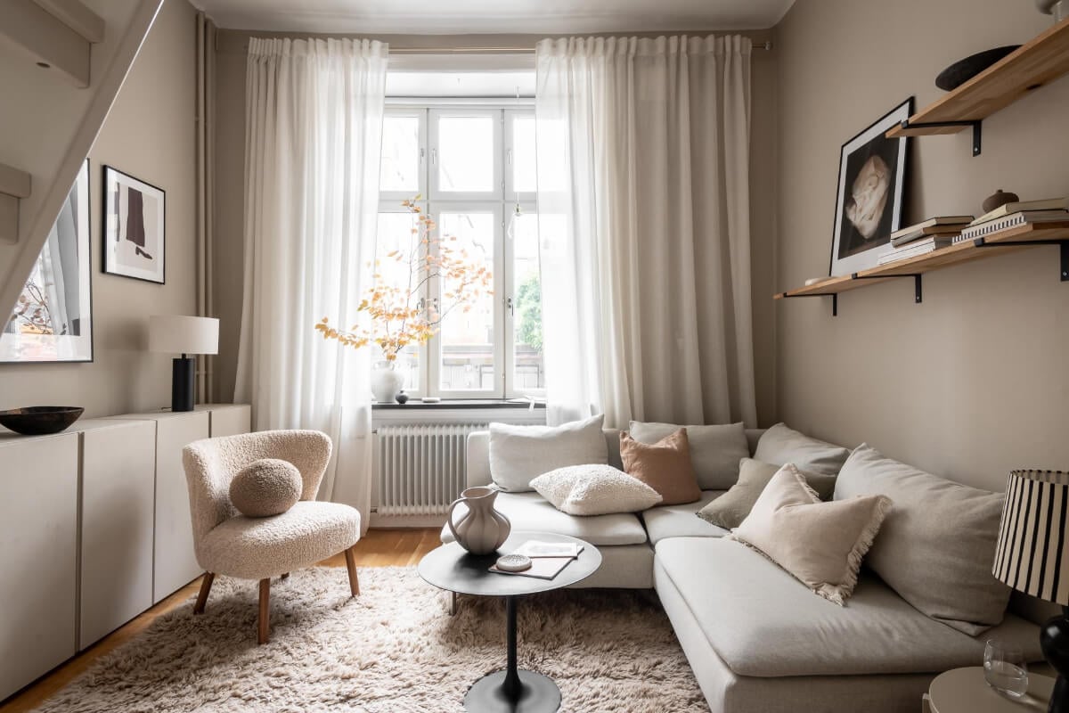 A Serene Studio Apartment with a Loft Bed and a Large Balcony 1 serene monochrome sitting room