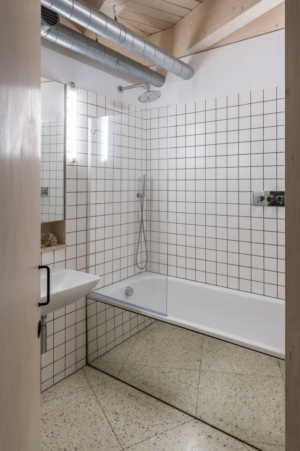 A Unique House in London with Plant-Filled Interiors and a Lush Garden 15 simple bathroom mirror tiles around bath