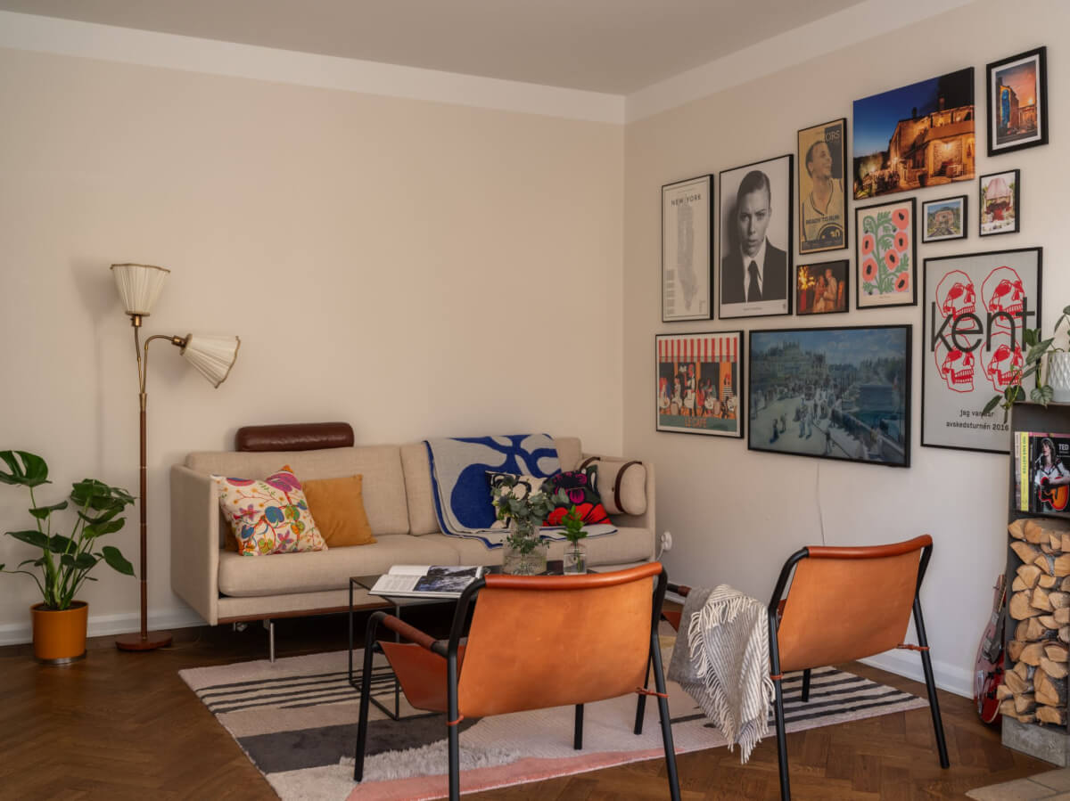 A Light, Renovated Two-Bedroom Apartment in Stockholm 11 sitting room rug gallery wall