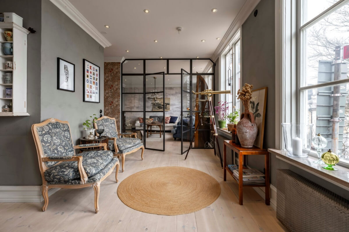 A Renovated 19th-Century Villa on Gotland 10 sitting room steel framed glass wall