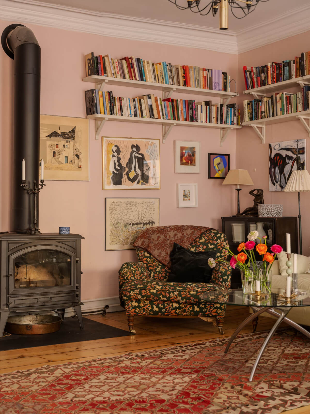 sitting room with bookshelves wood burner