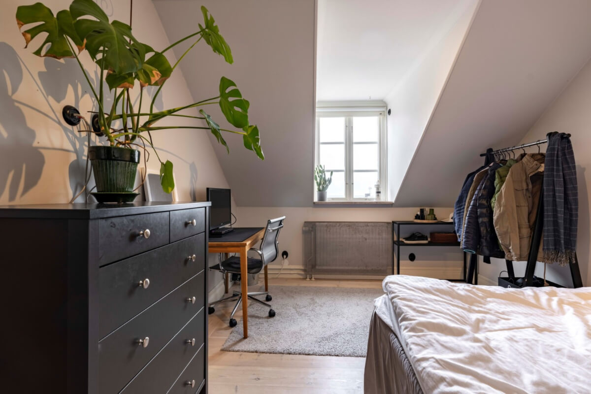 A Renovated 19th-Century Villa on Gotland 29 slanted ceiling bedroom with desk