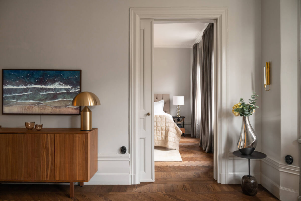Beautiful Period Features in a One-Bedroom Stockholm Apartment 8 sliding door into bedroom