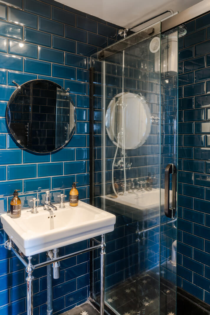 Timeworn Original Floorboards in a Regency Seaside Home 18 small bathroom dark blue subway tiles