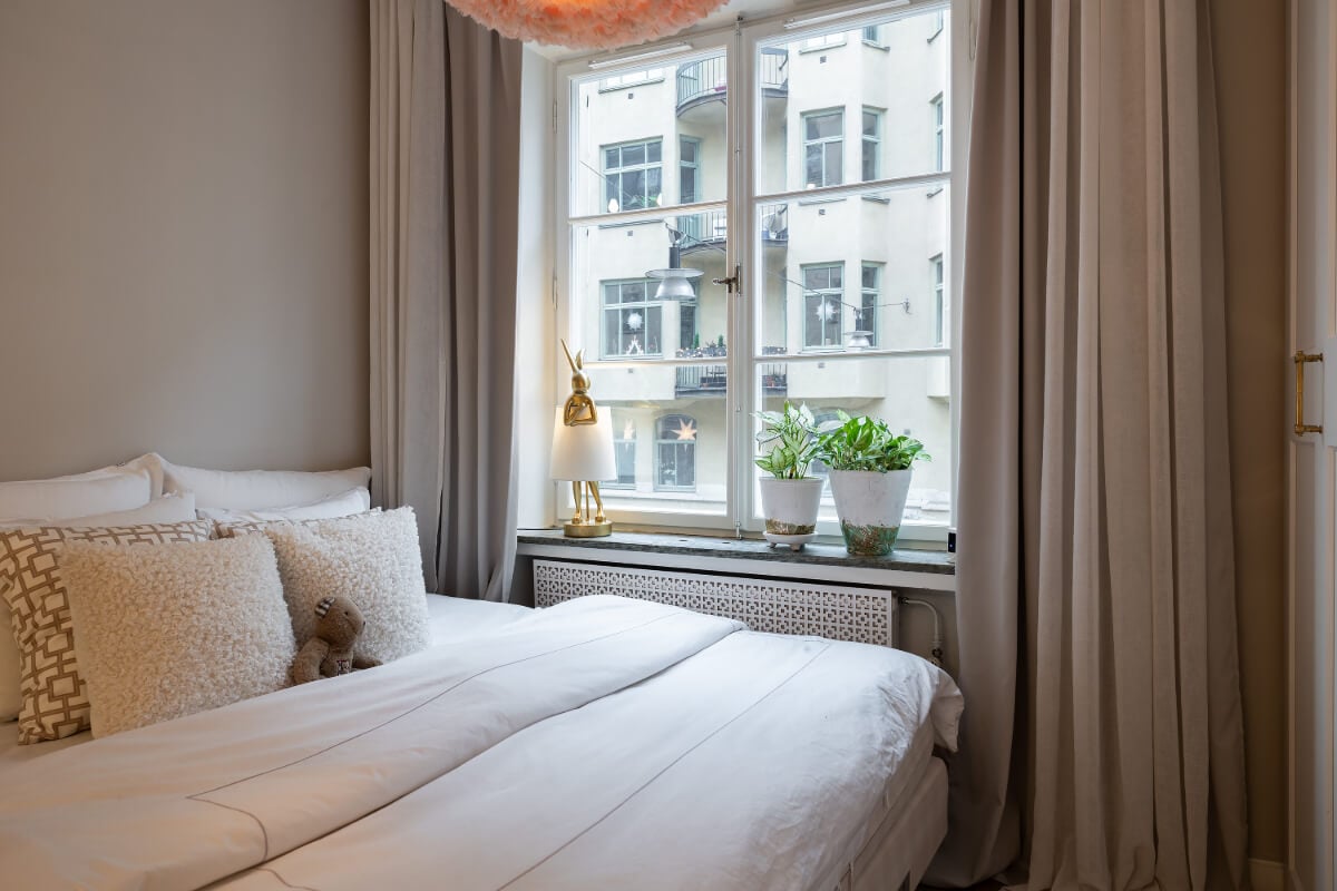 A Tiny and Luxurious Apartment in Stockholm 2 small bedroom calm color tones