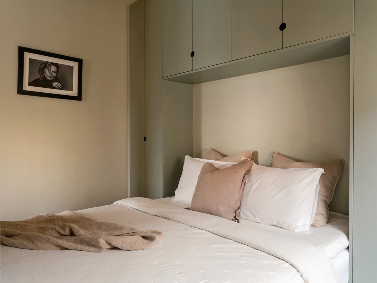 A Small Modern Stockholm Apartment with Smart Storage Solutions 9 small bedroom earthy textiles
