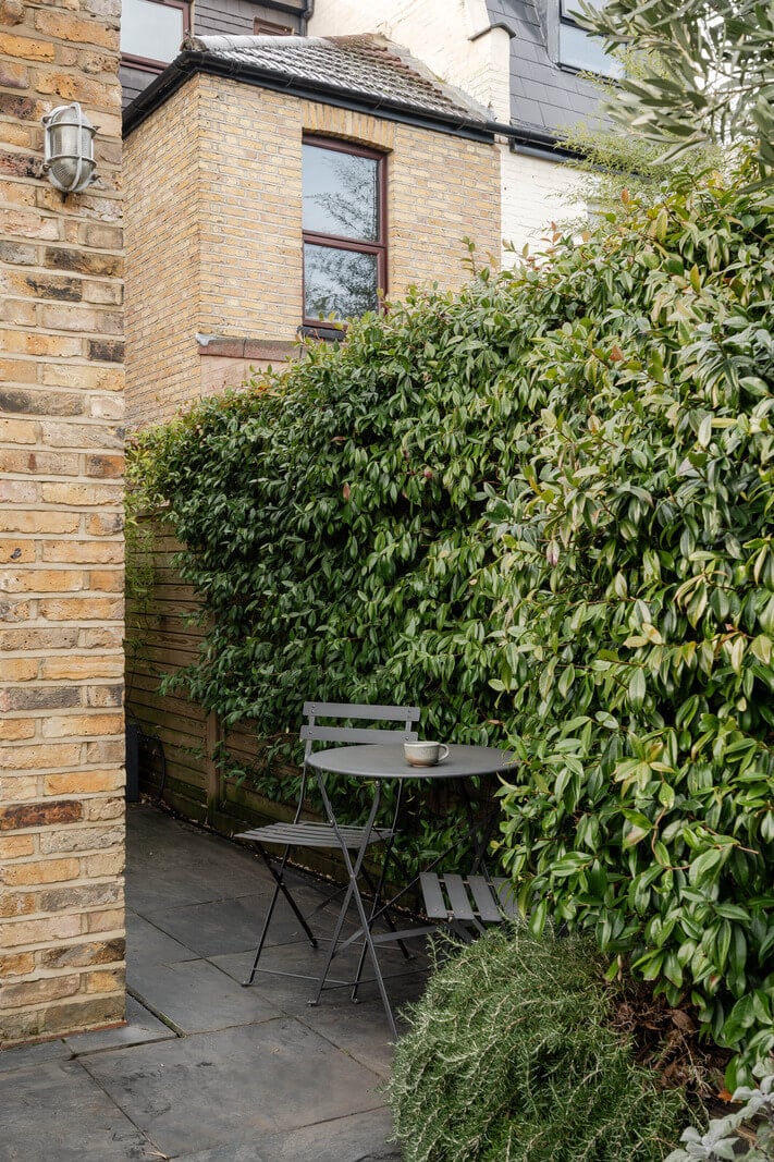 A Restored Victorian House with Exposed Brick and a Kitchen Extension 12 small bistro table garden