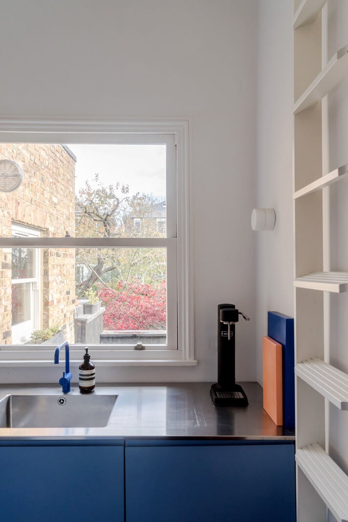 A Modern Apartment in a London Victorian House 12 small blue kitchen stainless steel countertop