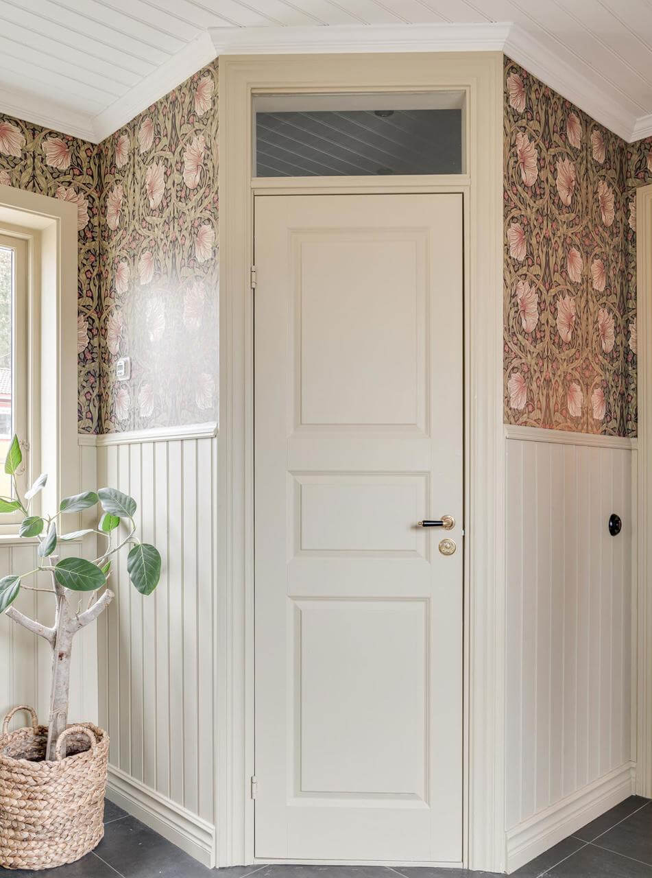 A Charming Home with Lake Views South of Stockholm 12 small door william morris wallpaper