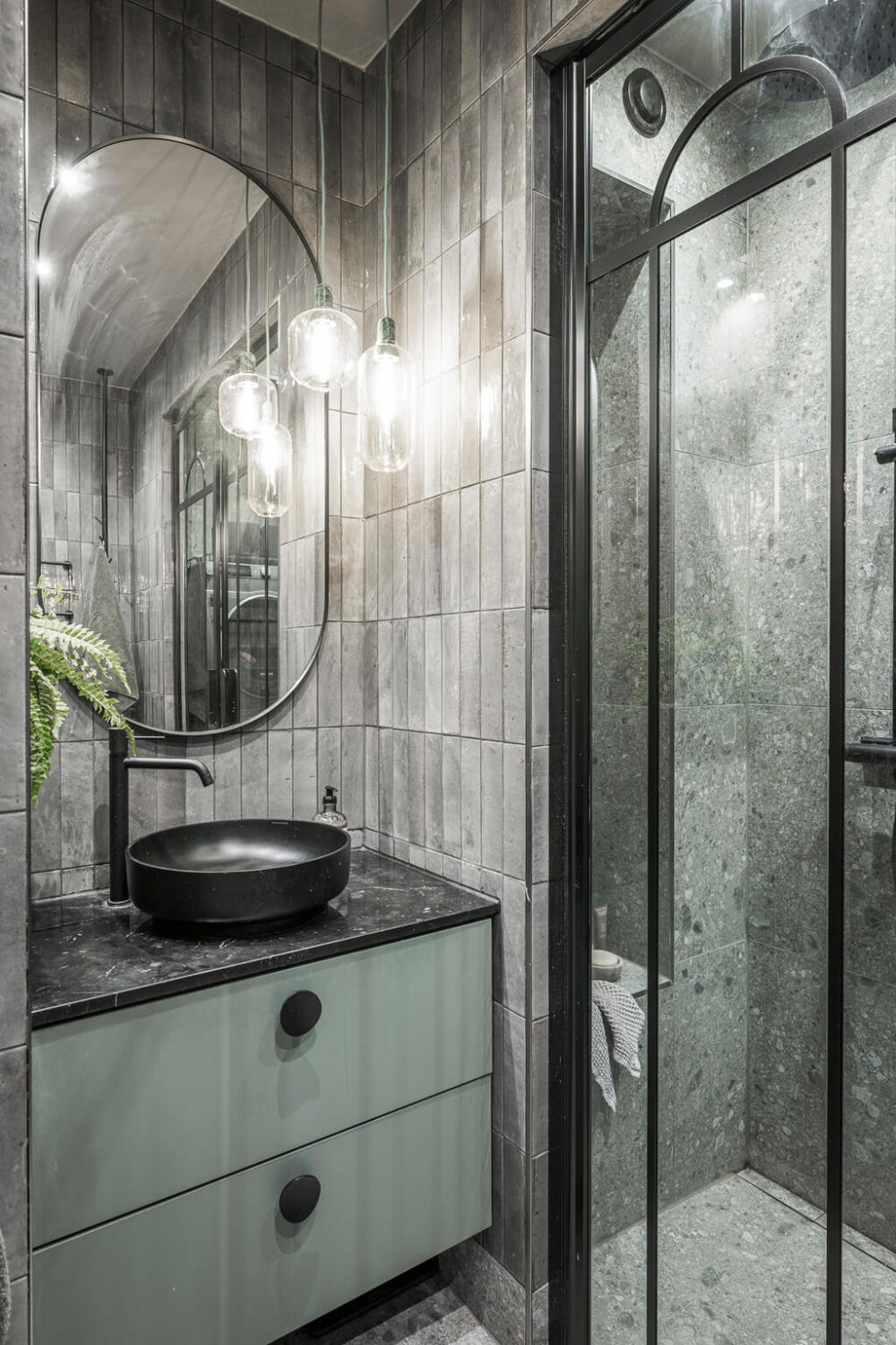 A Swedish Apartment with Exclusive Materials and Monochrome Color Scheme 15 small gray bathroom