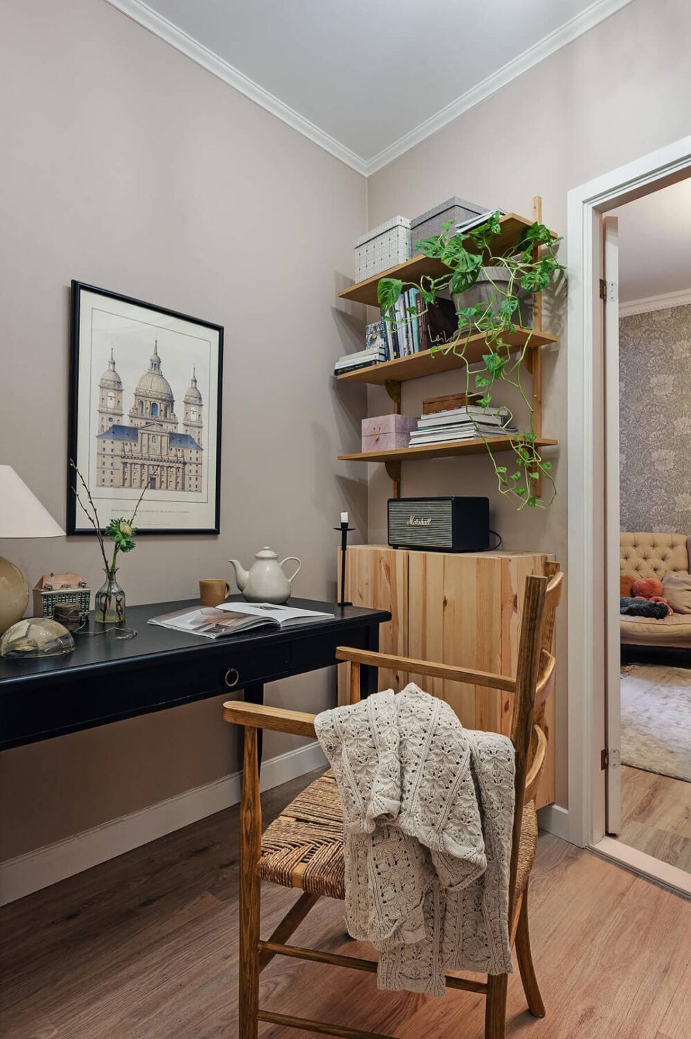 Warm and Inviting Rooms in a Renovated Swedish Apartment 22 small home office wooden shelves