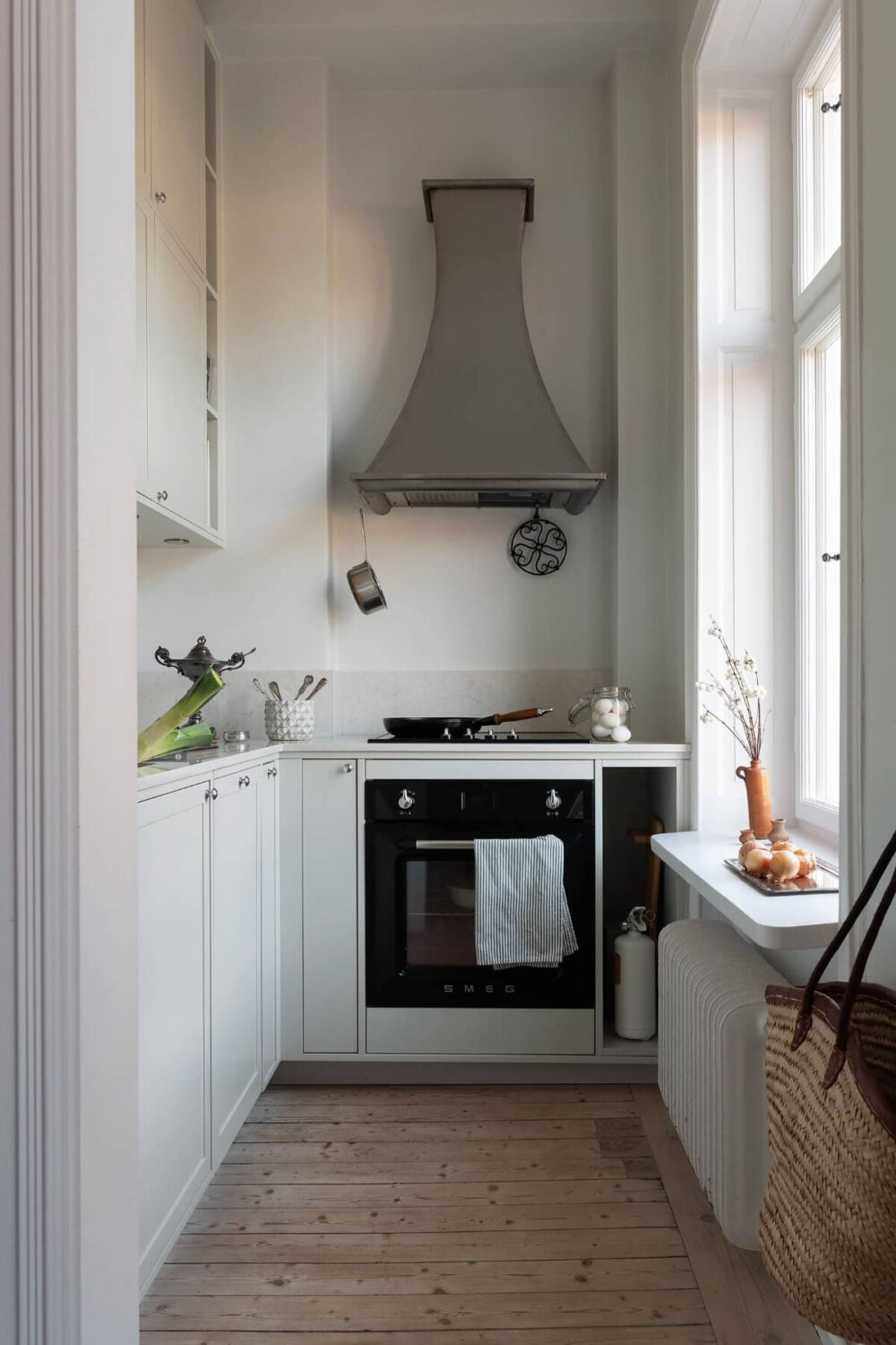 A Small Light Gray Apartment with Period Features 15 small kitchen double upper cabinets wooden floor