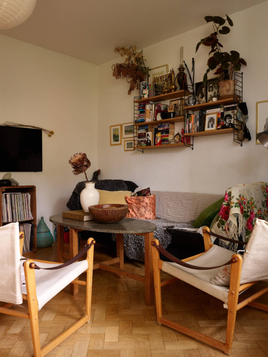A Small Vintage Apartment with a Tiny Green Patio Garden 3 small living room