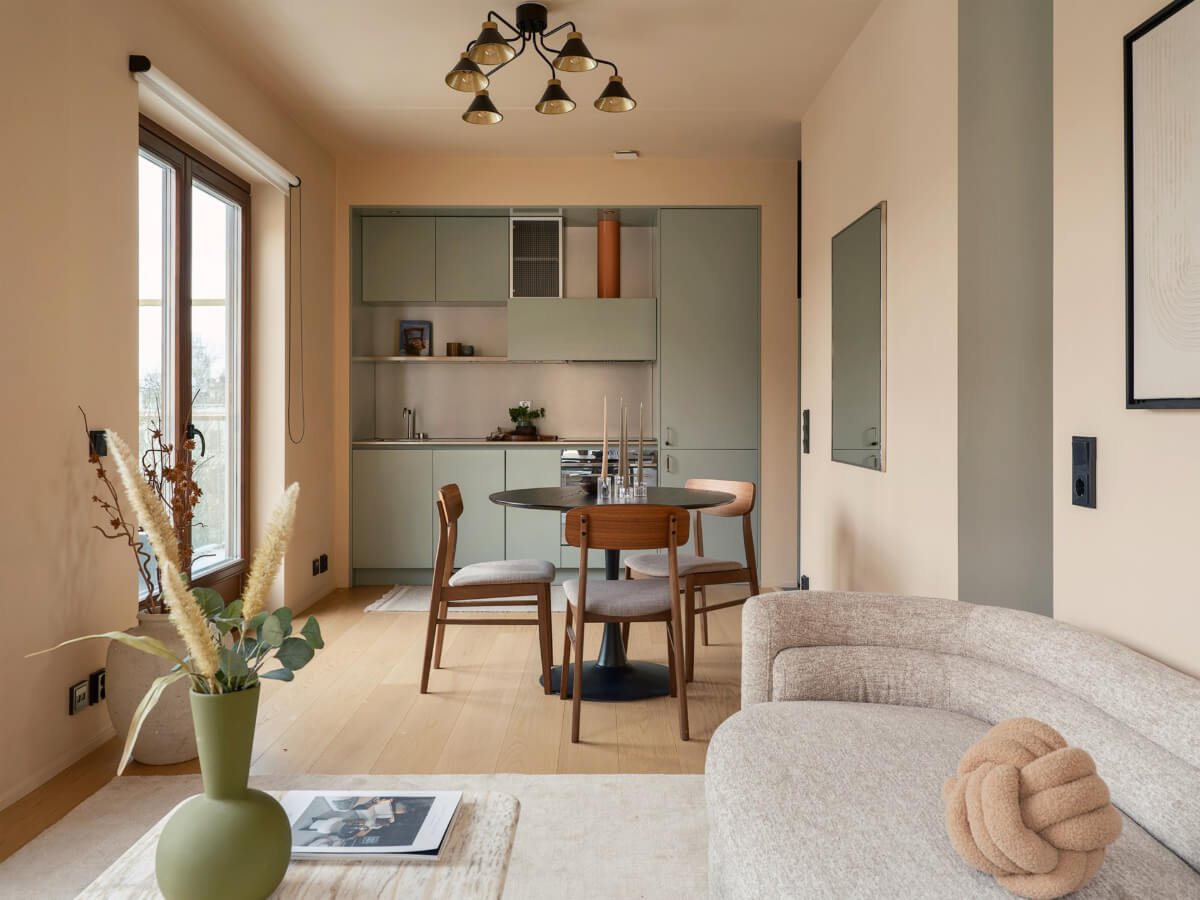 A Small Modern Stockholm Apartment with Smart Storage Solutions 2 small living room integrated kitchen
