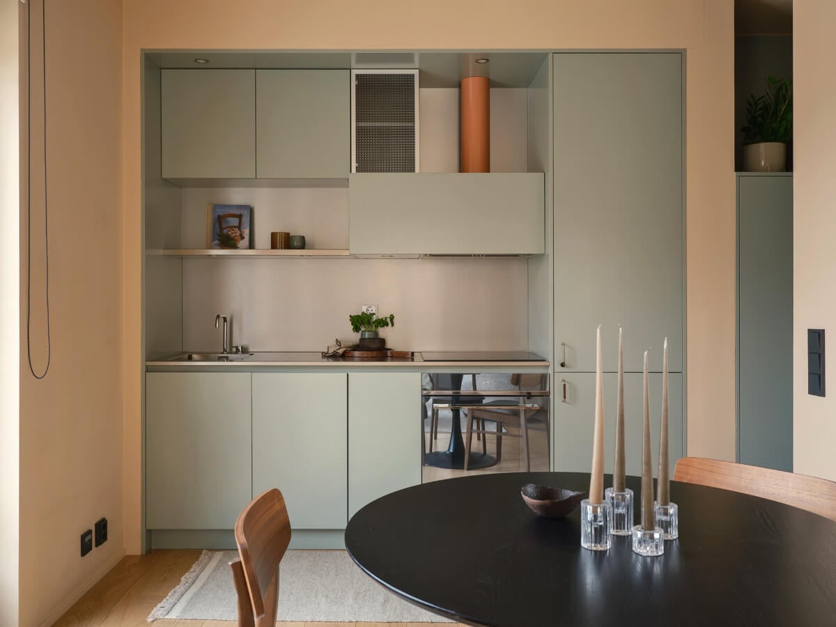 A Small Modern Stockholm Apartment with Smart Storage Solutions 14 small modern kitchen round table