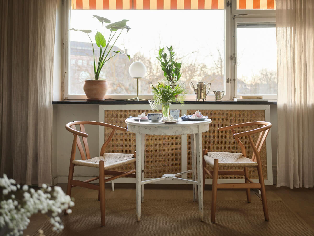 A Small Stockholm Apartment with a Tiny Green Bedroom 8 small round table