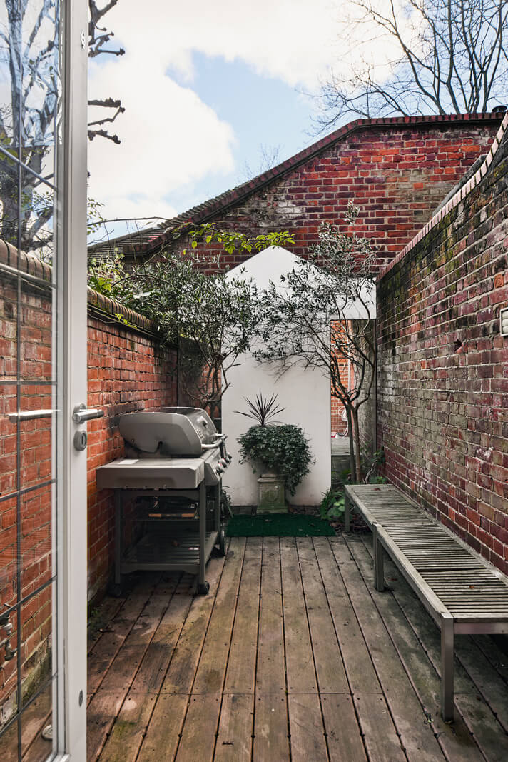 A Stunning Victorian House with Period Features and Surprising Spaces 27 small walled terrace