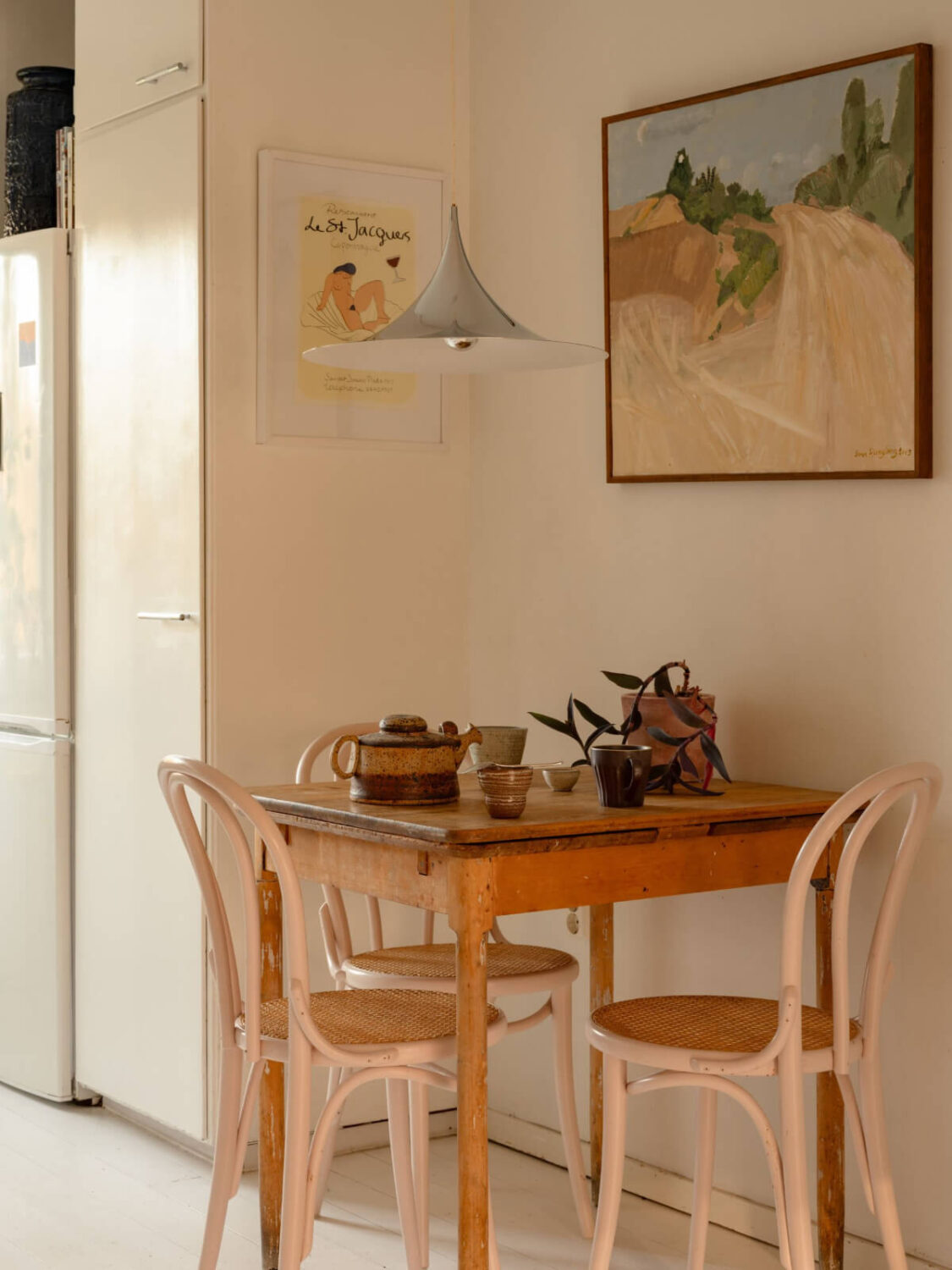 A Charming Midcentury Apartment with a Reading Room 13 small wooden kitchen table