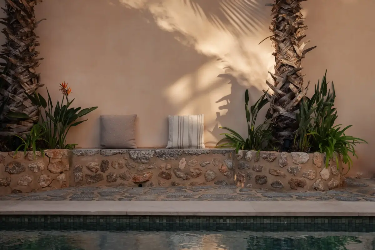 Old-World Craftsmanship and Contemporary Elegance in a Mallorcan Townhouse 18 stone bench garden mallorca