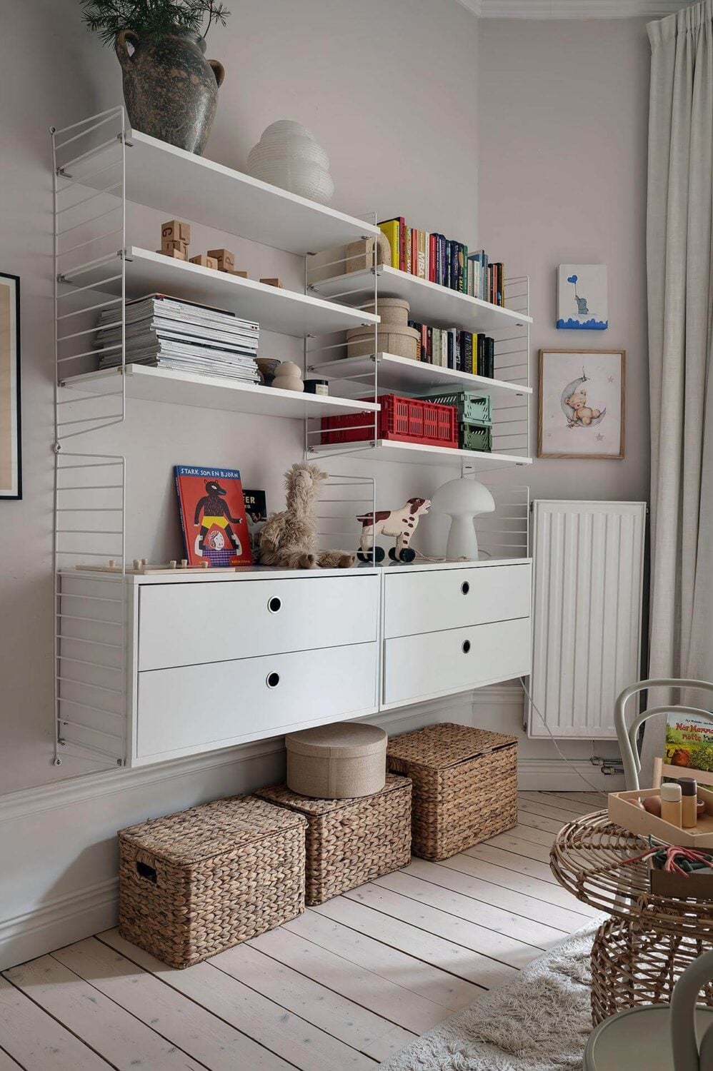 Period Features and Modern Materials in a Swedish Apartment 27 string shelving system
