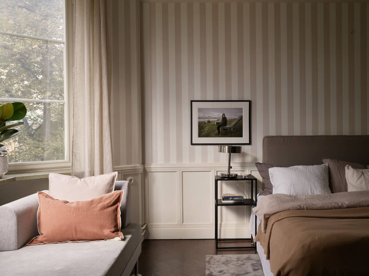 A Grand Early 20th-Century Apartment in Stockholm 21 striped wallpaper bedroom