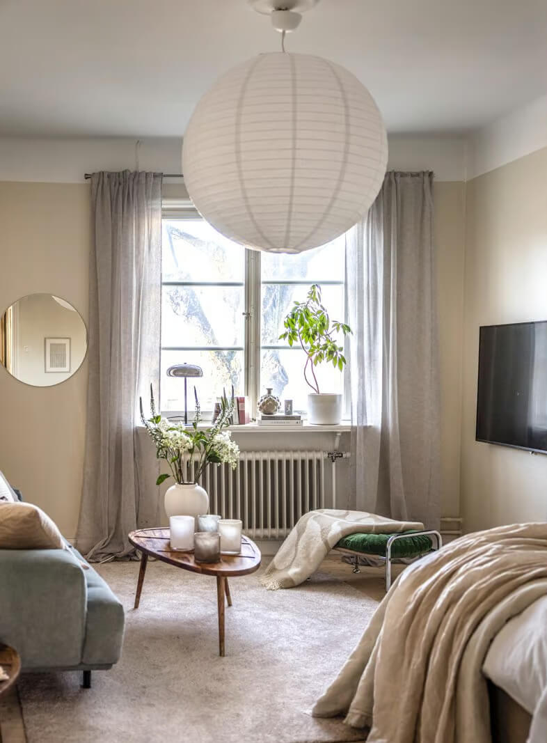 A Beige Studio Apartment with a Bright Kitchen 3 studio apartment beige walls