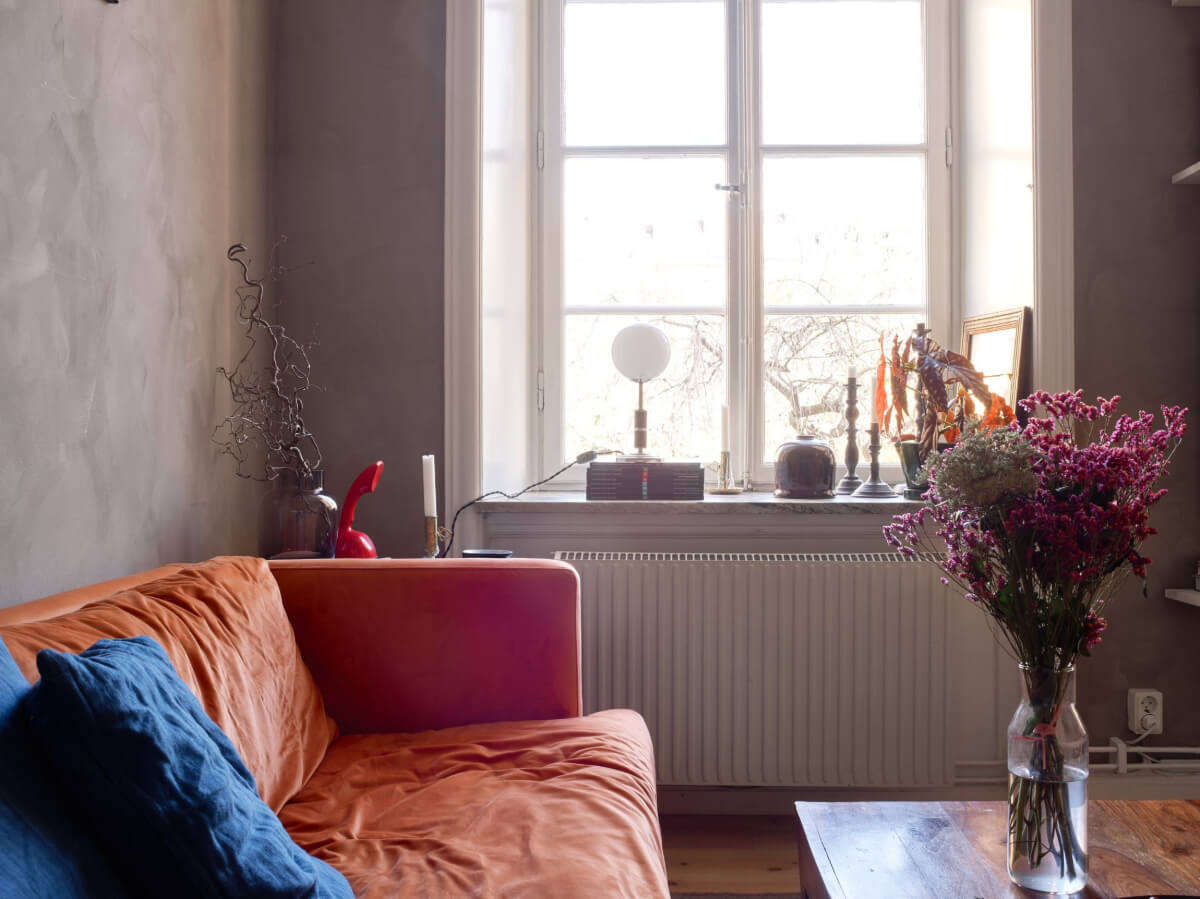 A Studio Apartment with Smart Storage Ideas and Exposed Brick 5 studio apartment large windows