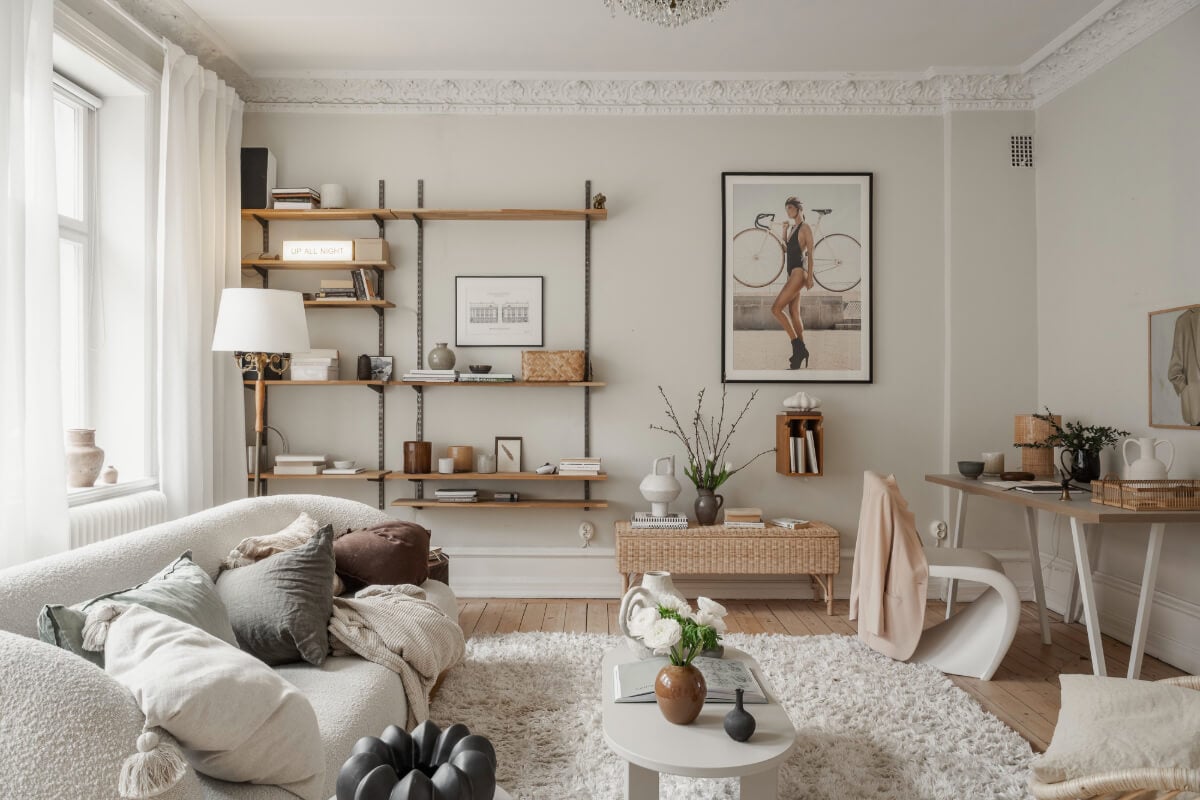 A Stylish Studio Apartment with Period Features and Large Windows 2 studio apartment light gray walls shelves desk