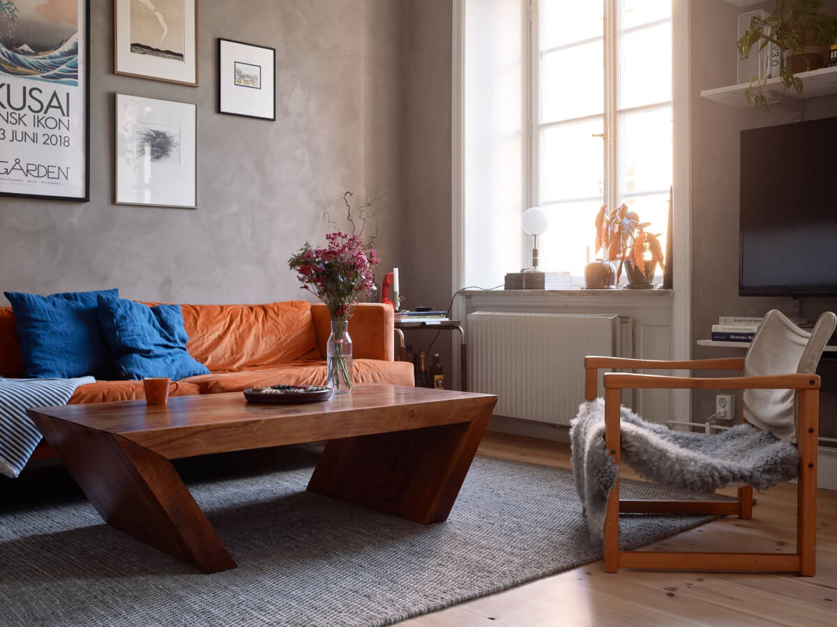A Studio Apartment with Smart Storage Ideas and Exposed Brick 4 studio apartment sitting area