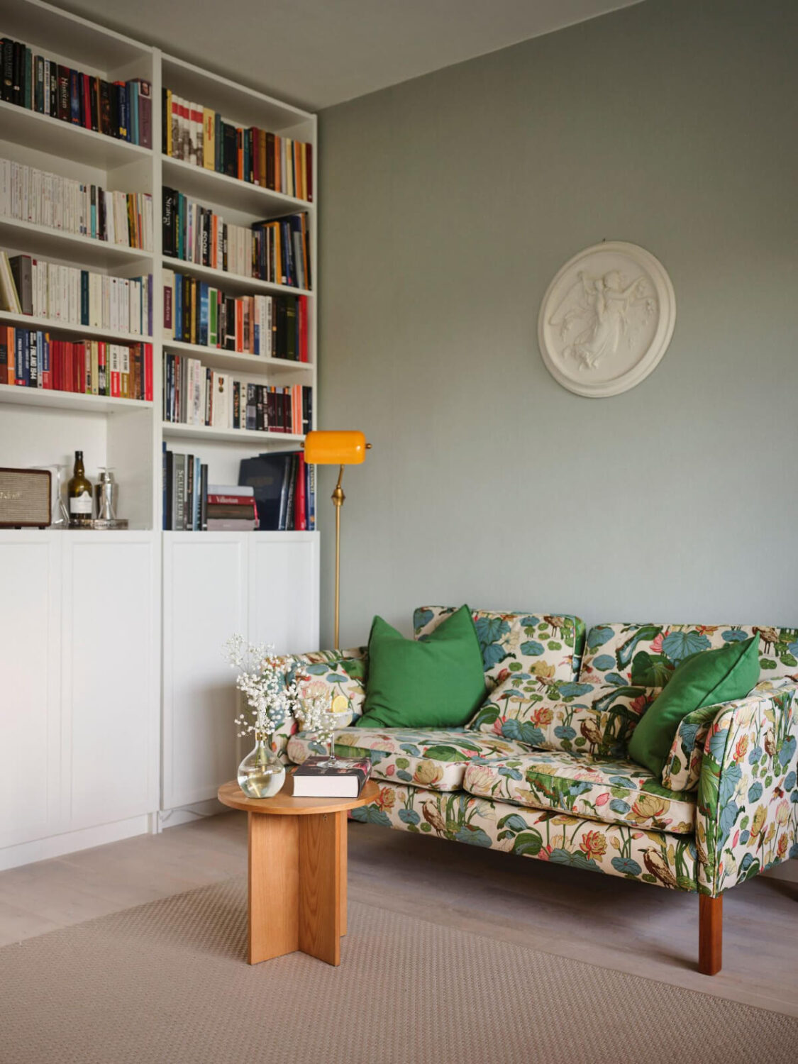 A Small Stockholm Apartment with a Tiny Green Bedroom 2 studio patterned sofa